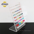 Jinbao Clear display acrílico pendiente standmall joyero display riser